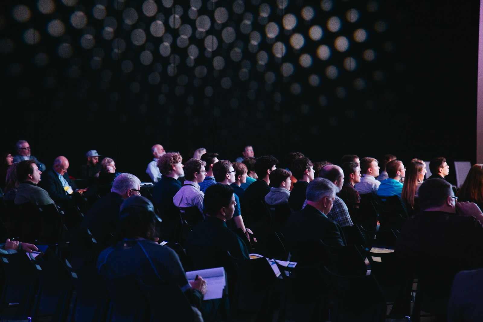 Conference audience seated during a session
